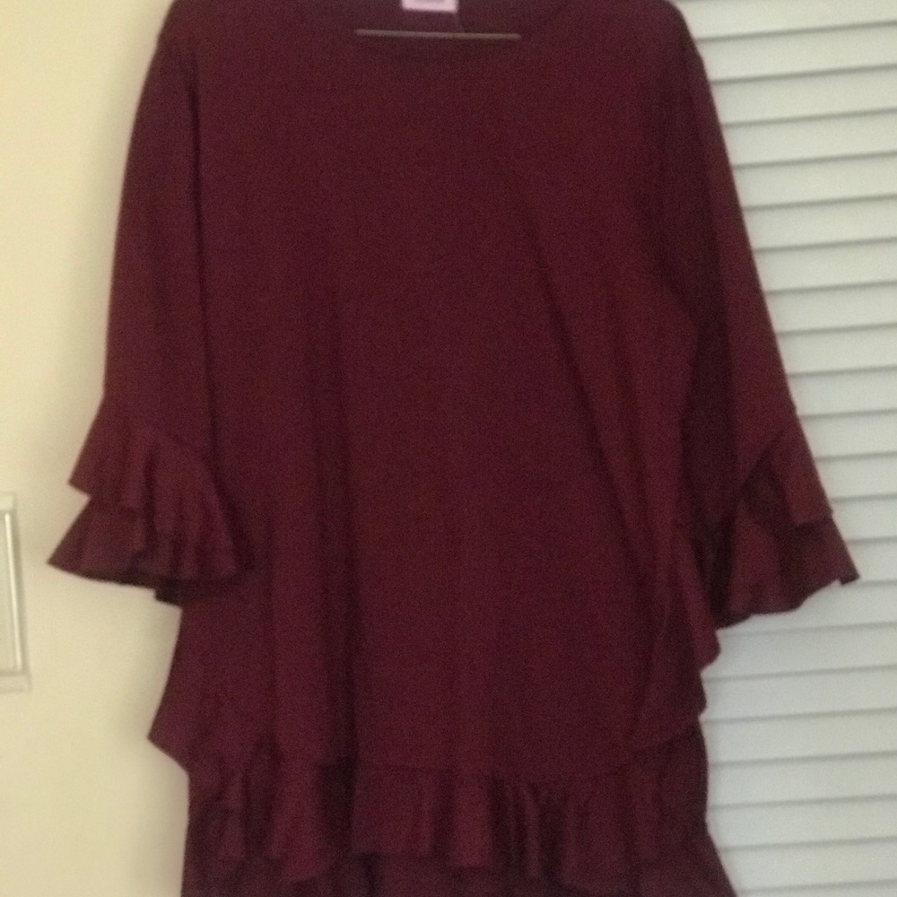 Burgundy tunic with ruffle hem